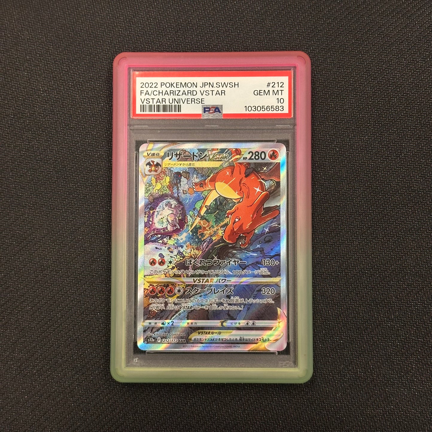Pokémon trading card in a protective case on a dark background
