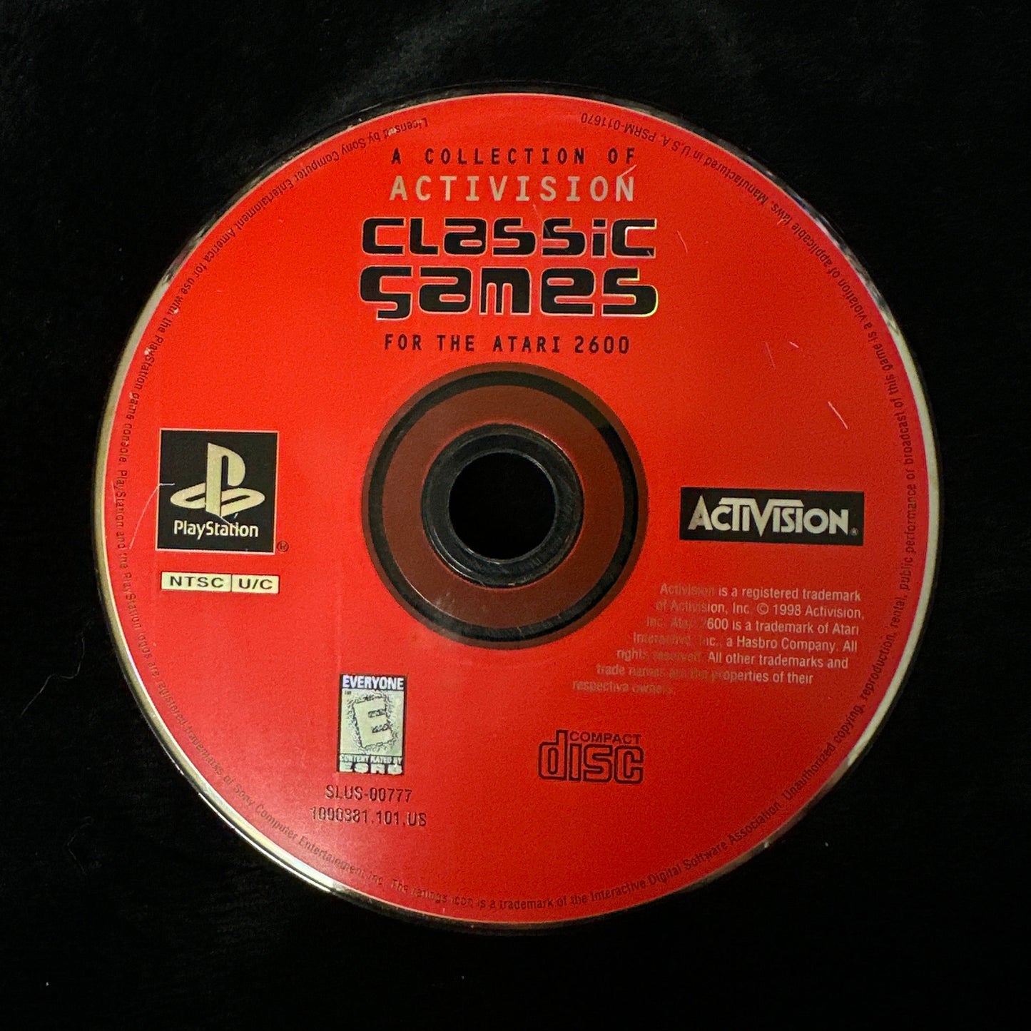 Red game disc with Activision and PlayStation logos on a black background