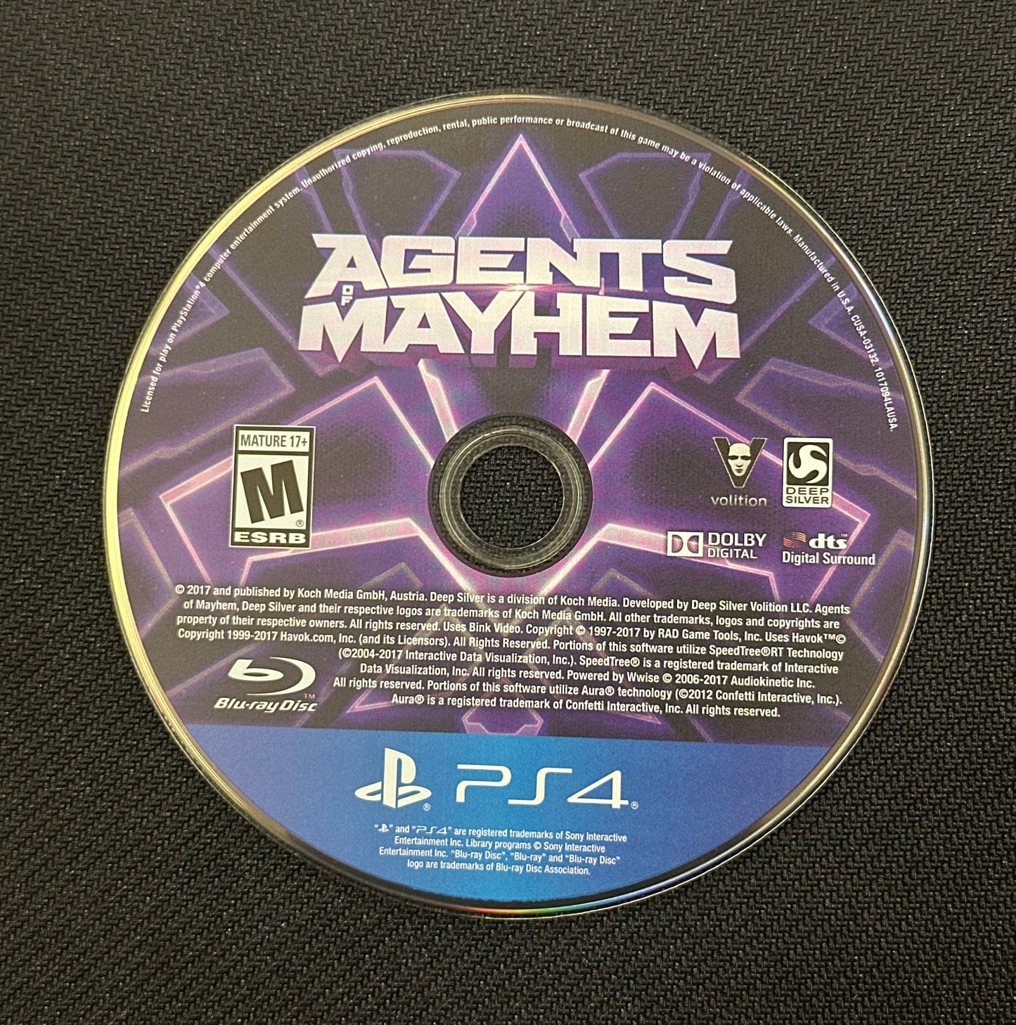 Game disc for 'Agents of Mayhem' on a black surface
