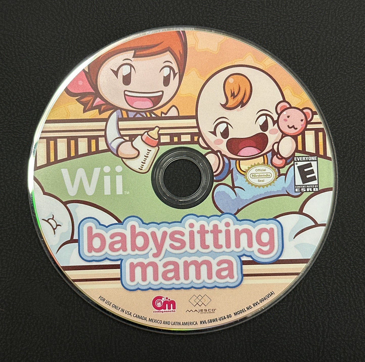 Disc from 'Babysitting Mama' game for Wii on a black background