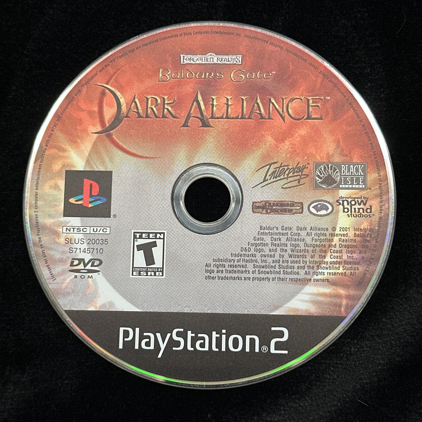 PlayStation 2 game disc labeled 'Dark Alliance' on a black background