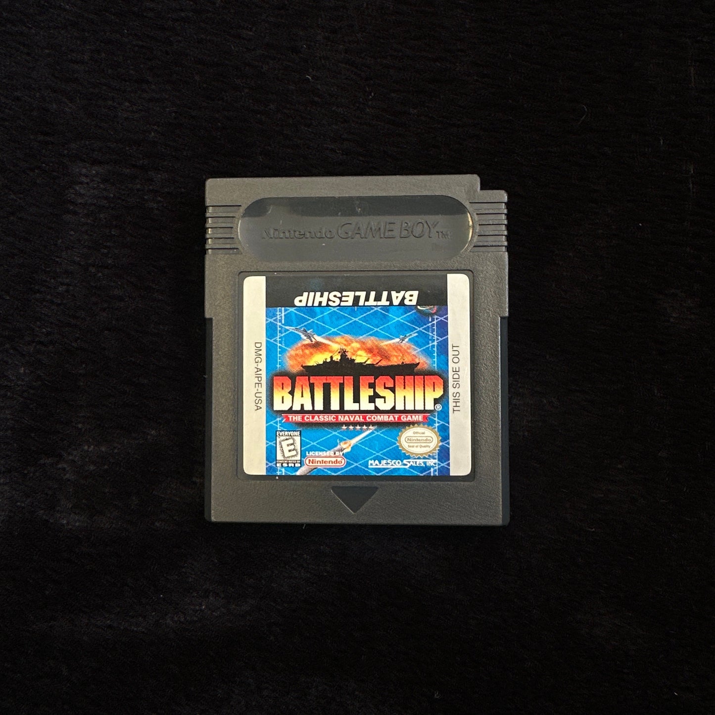 Game cartridge with 'Battleship' on a black background