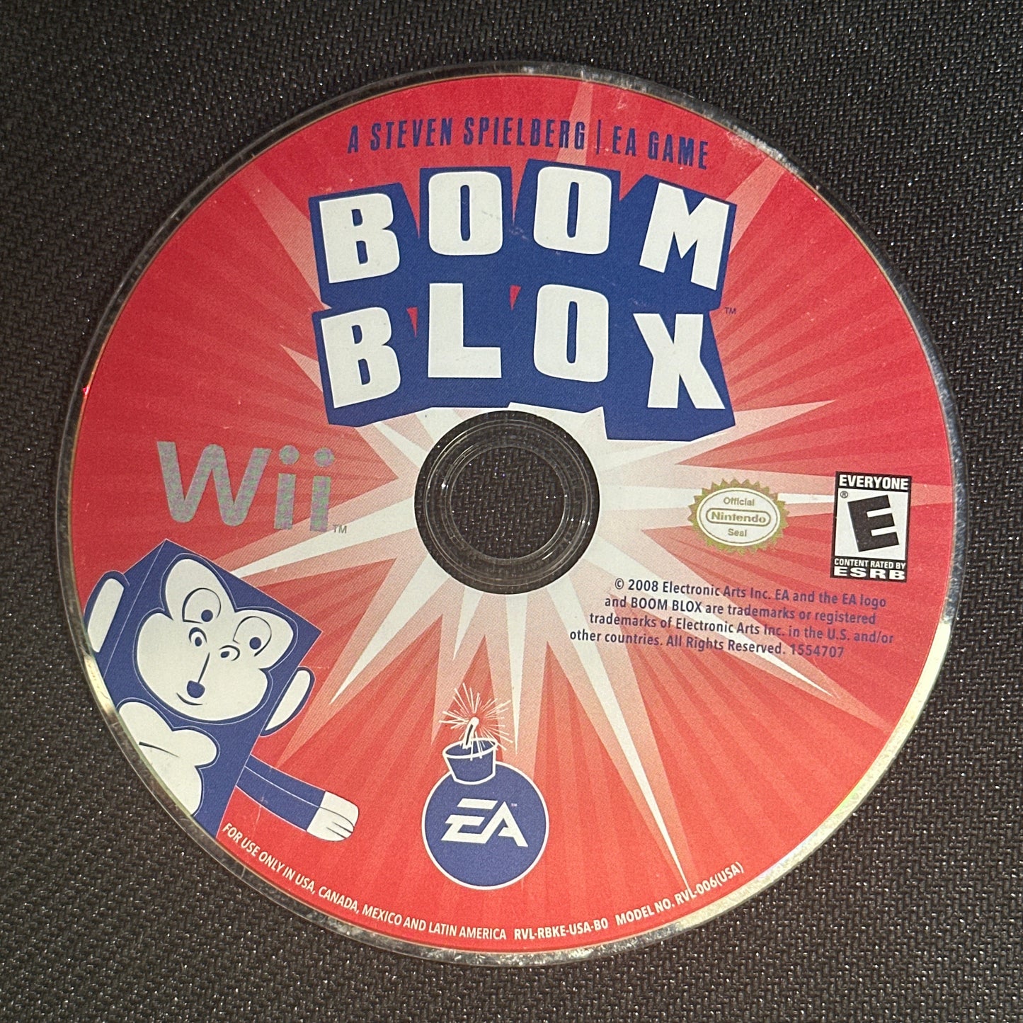 Boom Blox game disc on a black background
