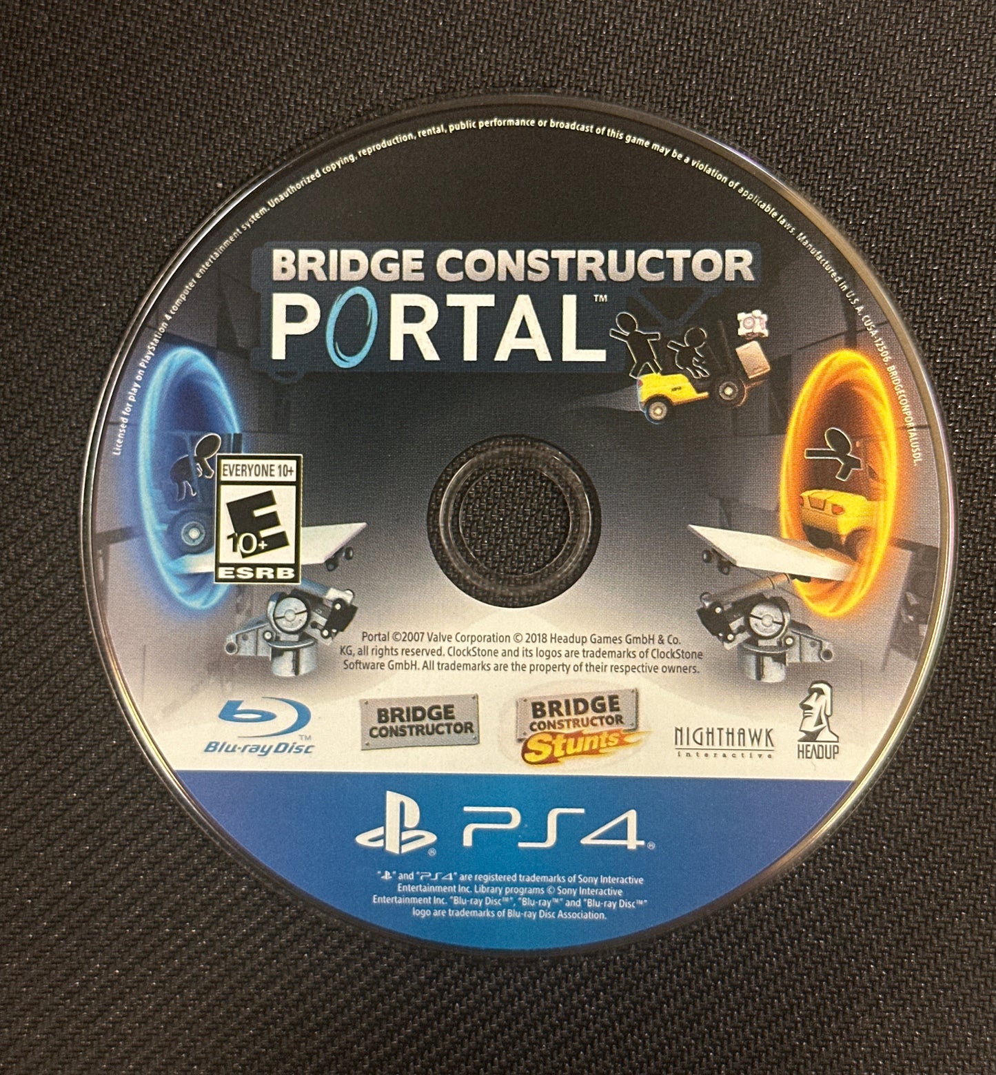 Disc for 'Bridge Constructor Portal' game on PS4 console