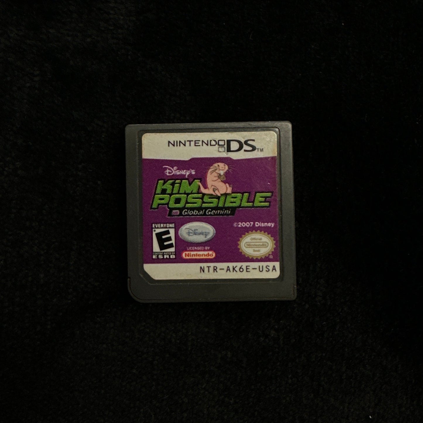 Nintendo DS game cartridge on a dark background