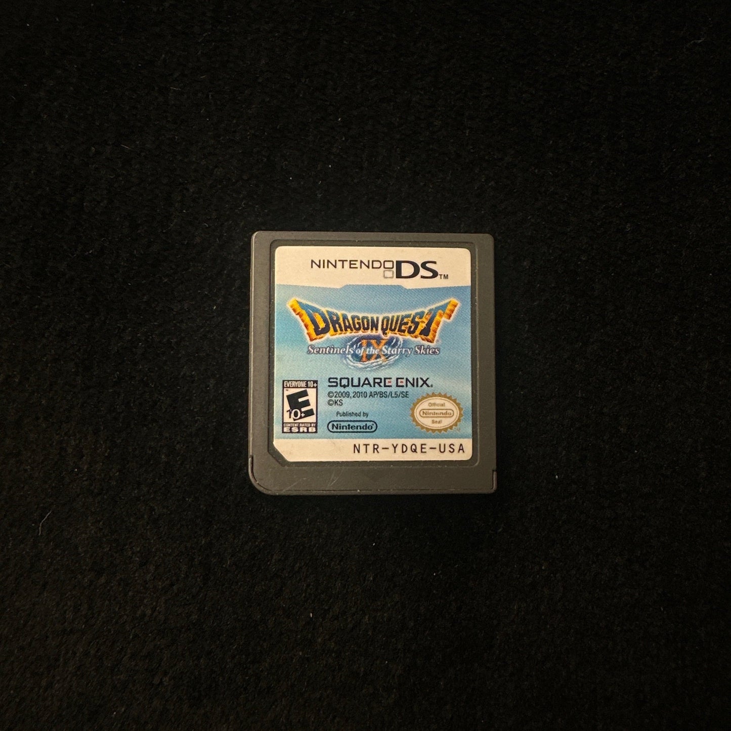 Nintendo DS game cartridge on a black background