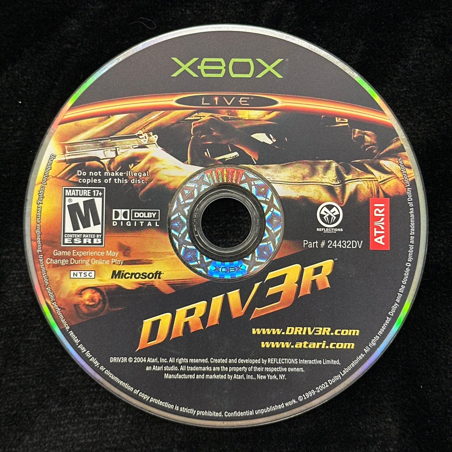 Game disc for 'Driver 3' on an Xbox console with branding and graphics.