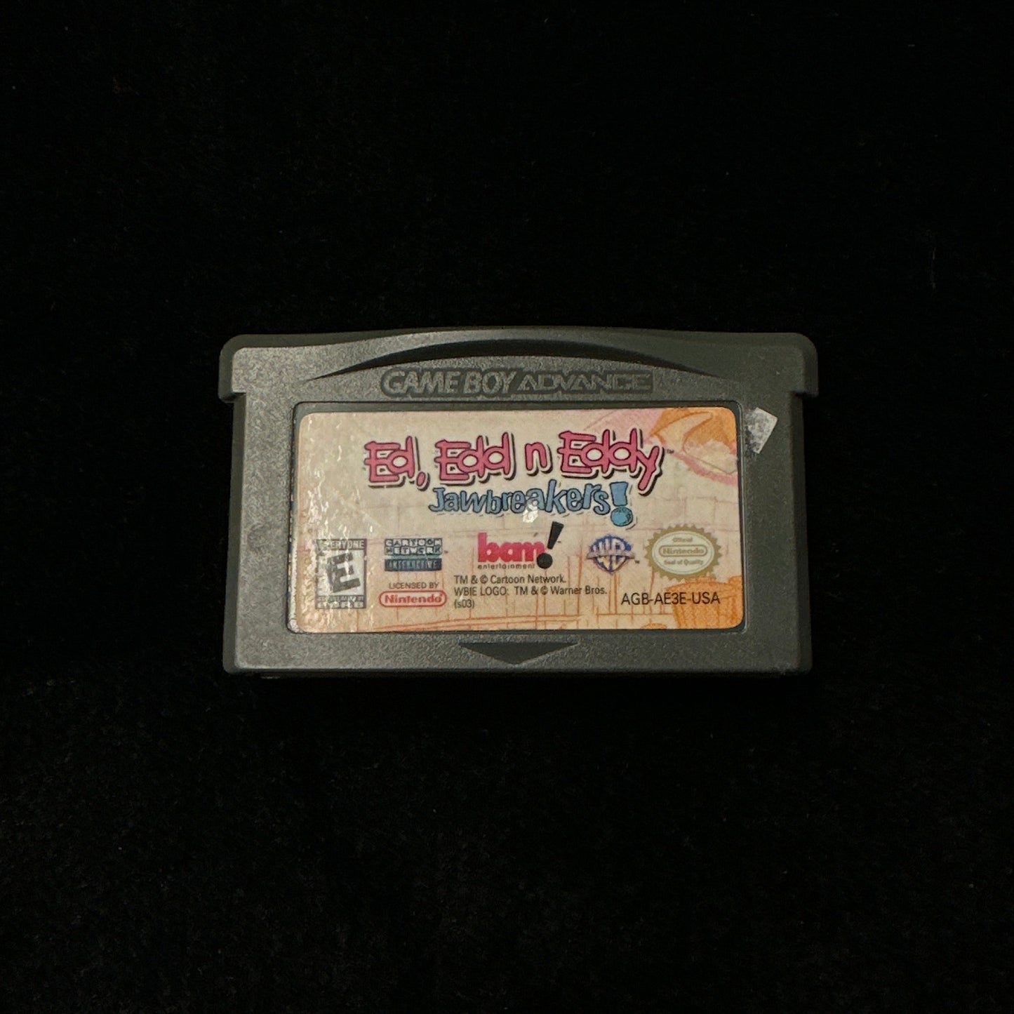 Game cartridge on a black background