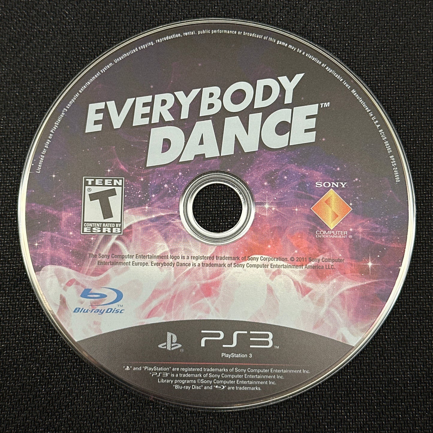 Game disc for 'Everybody Dance' on a black surface