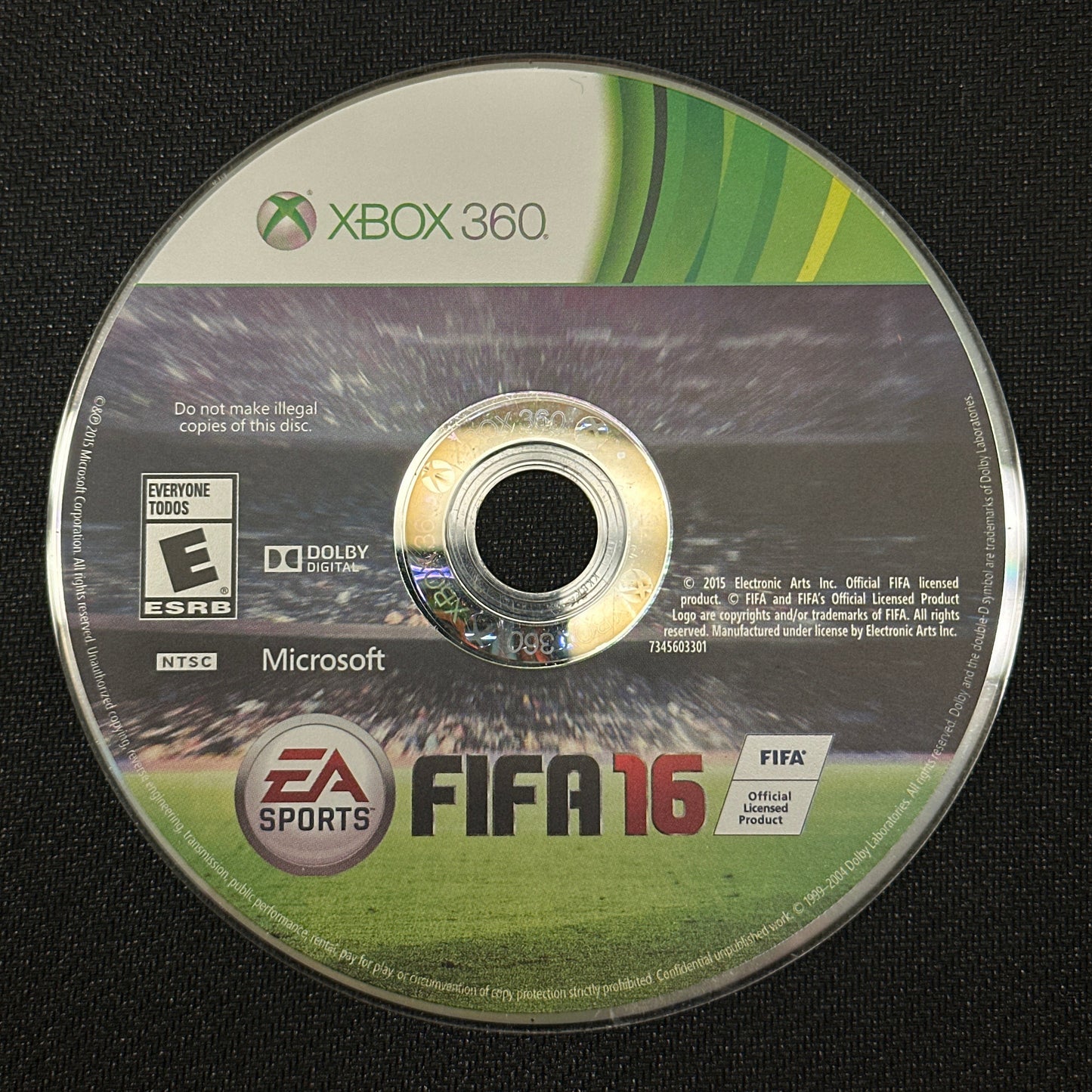 FIFA 16 game disc for Xbox 360 on a black background