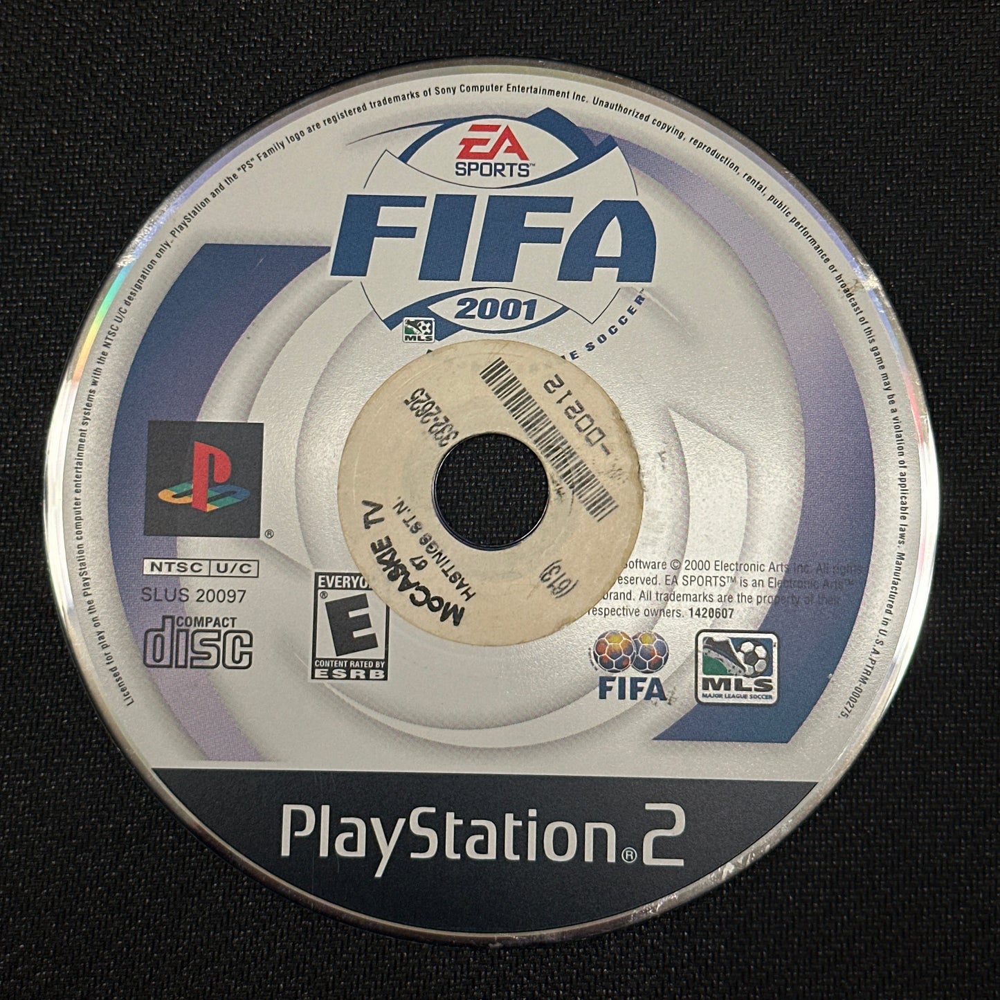 FIFA 2001 PlayStation 2 game disc on a black background