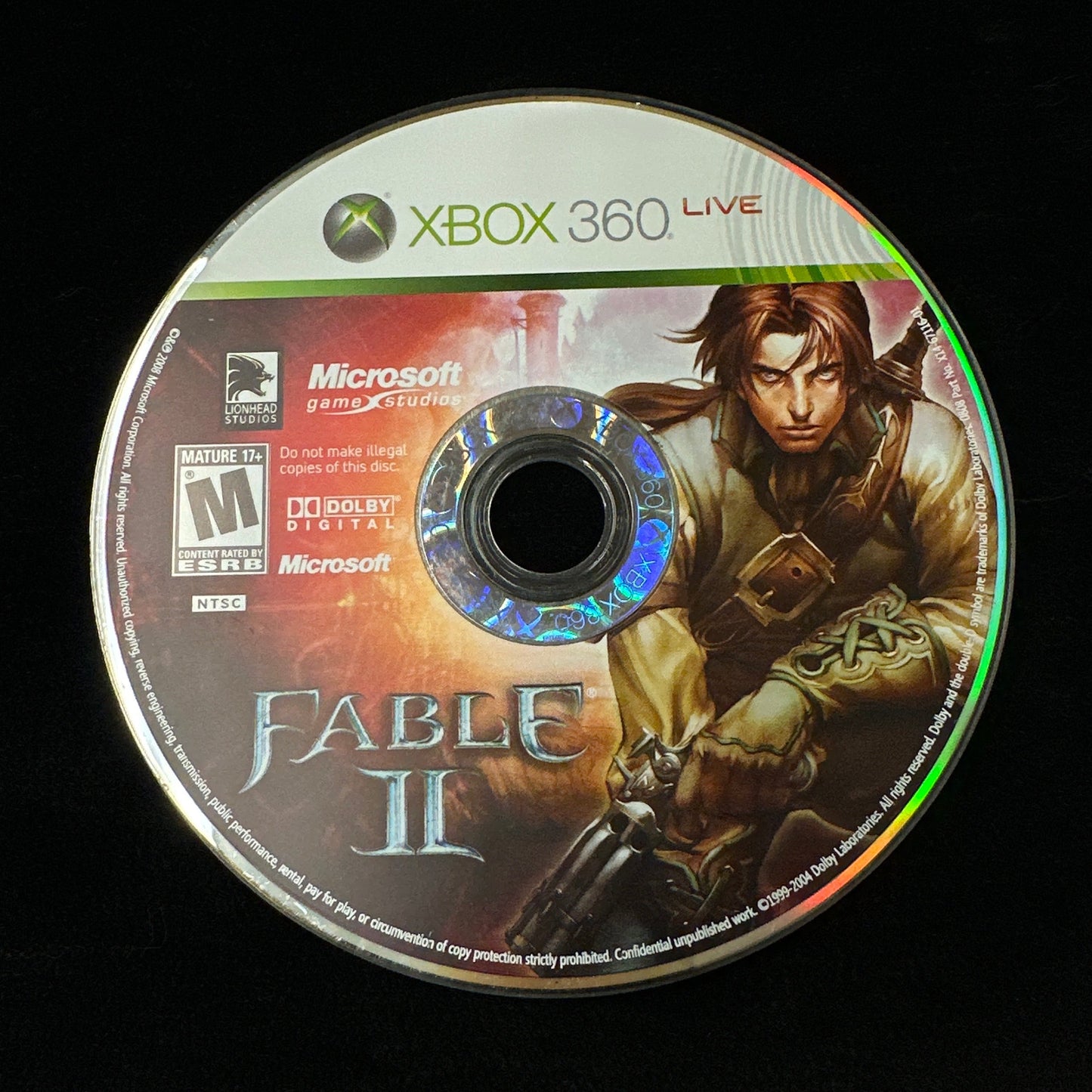 Game disc for 'Fable II' on Xbox 360 with character artwork on a black background