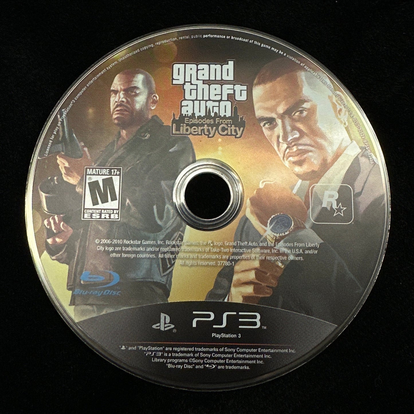 Game disc for 'Grand Theft Auto: Liberty City' on a black background