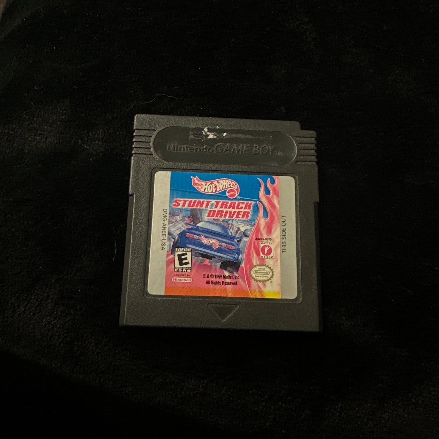 Game cartridge on a dark surface