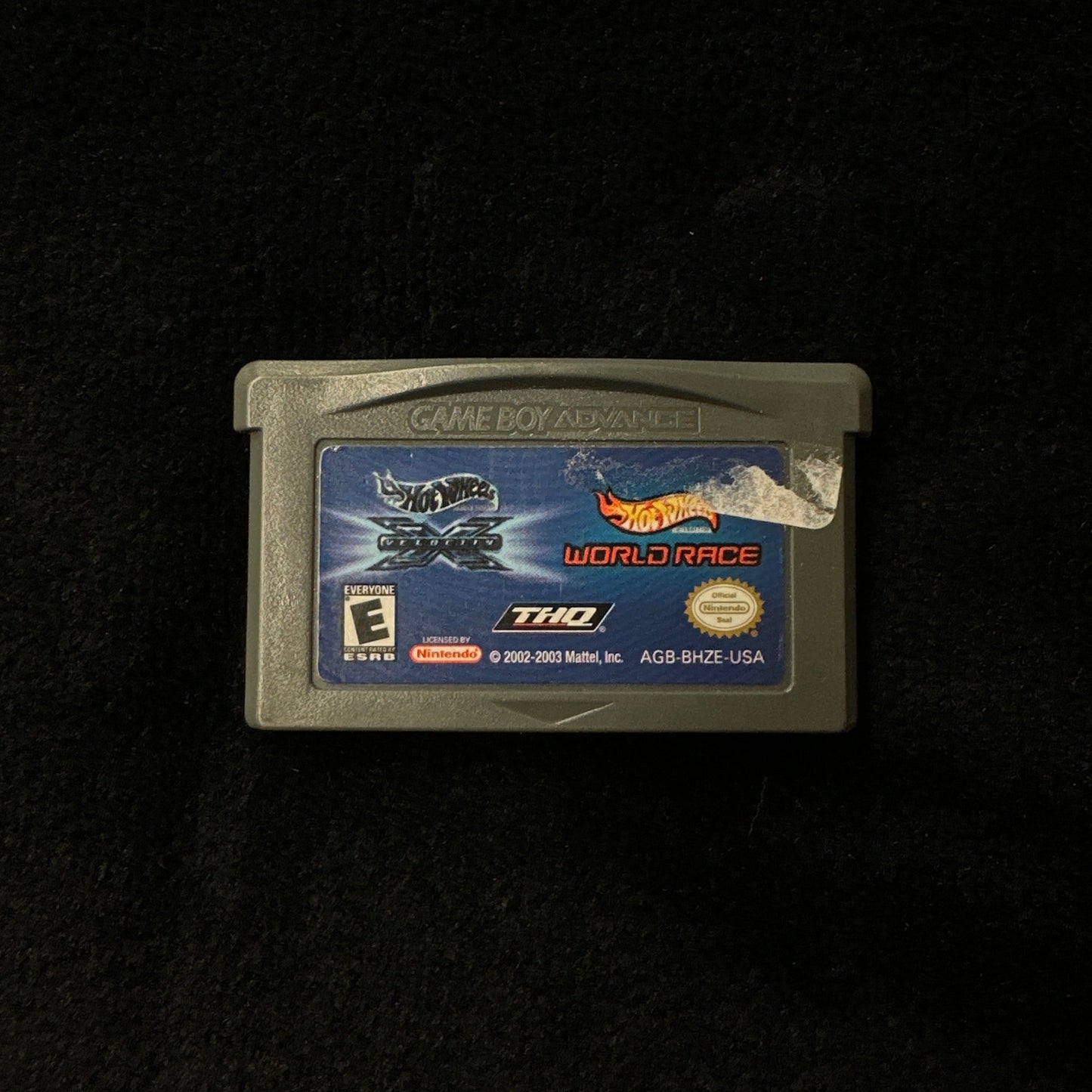 Game cartridge on a black background