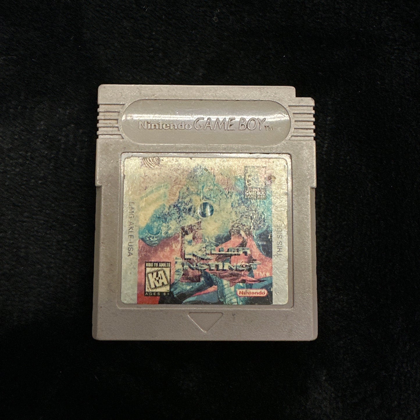 Game cartridge on a black background