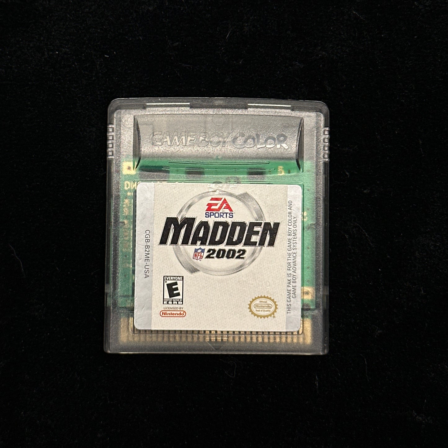 Gaming cartridge for 'Madden 2002' on a black background