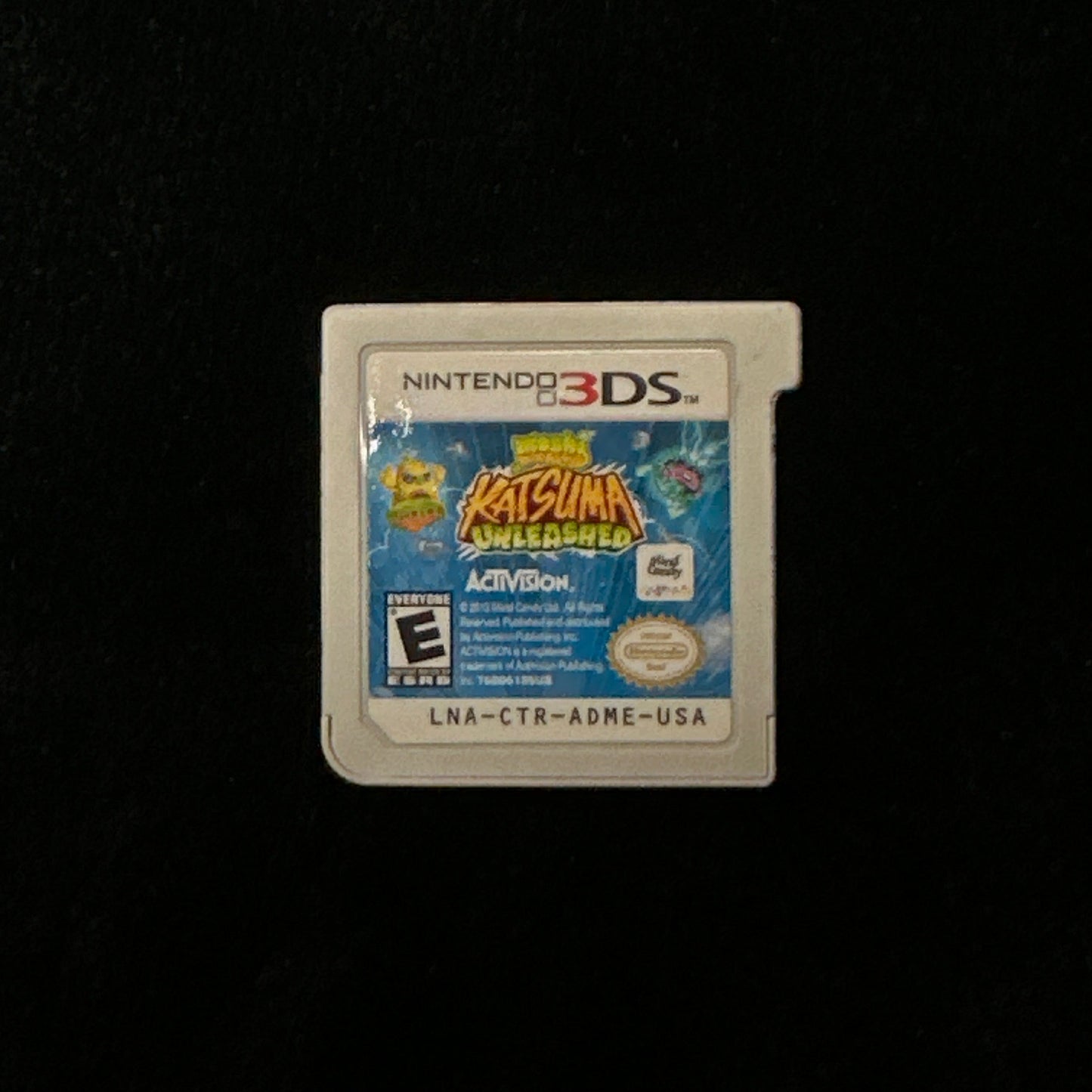 Nintendo 3DS game cartridge on a black background