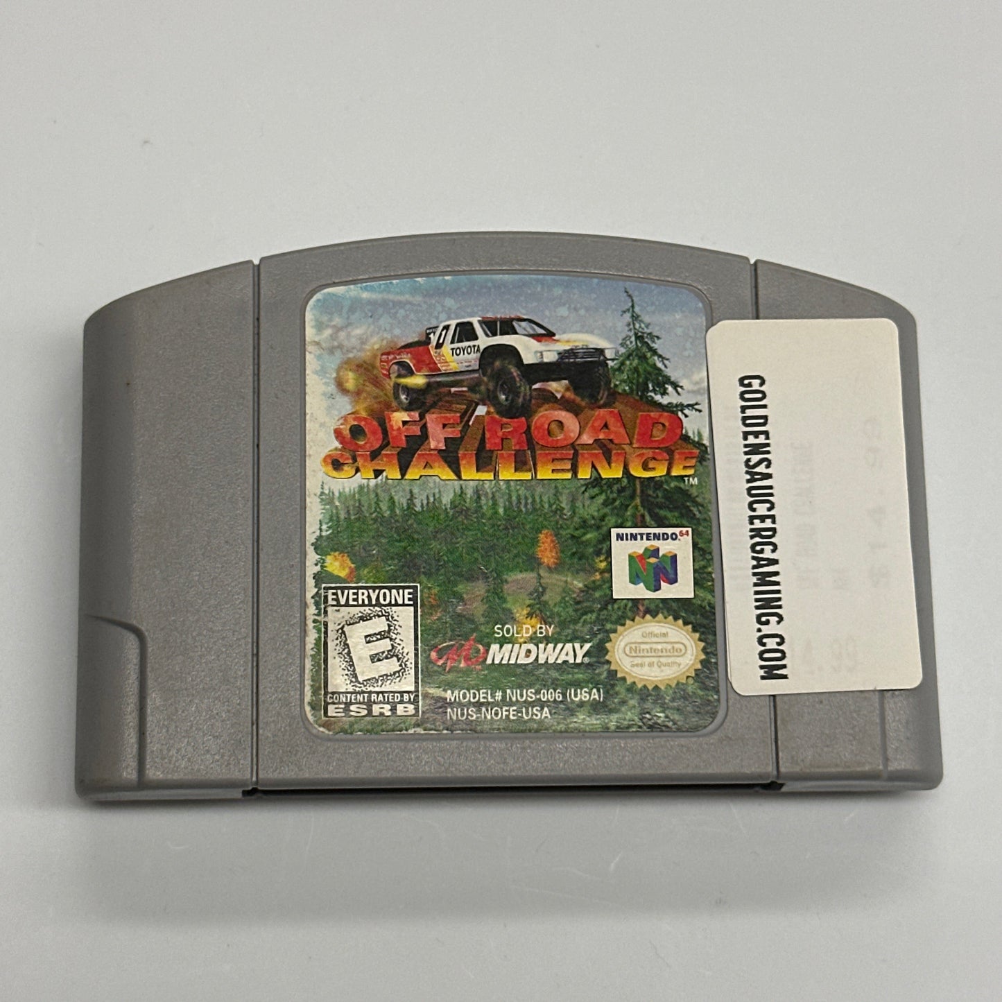 Game cartridge with label on a gray background