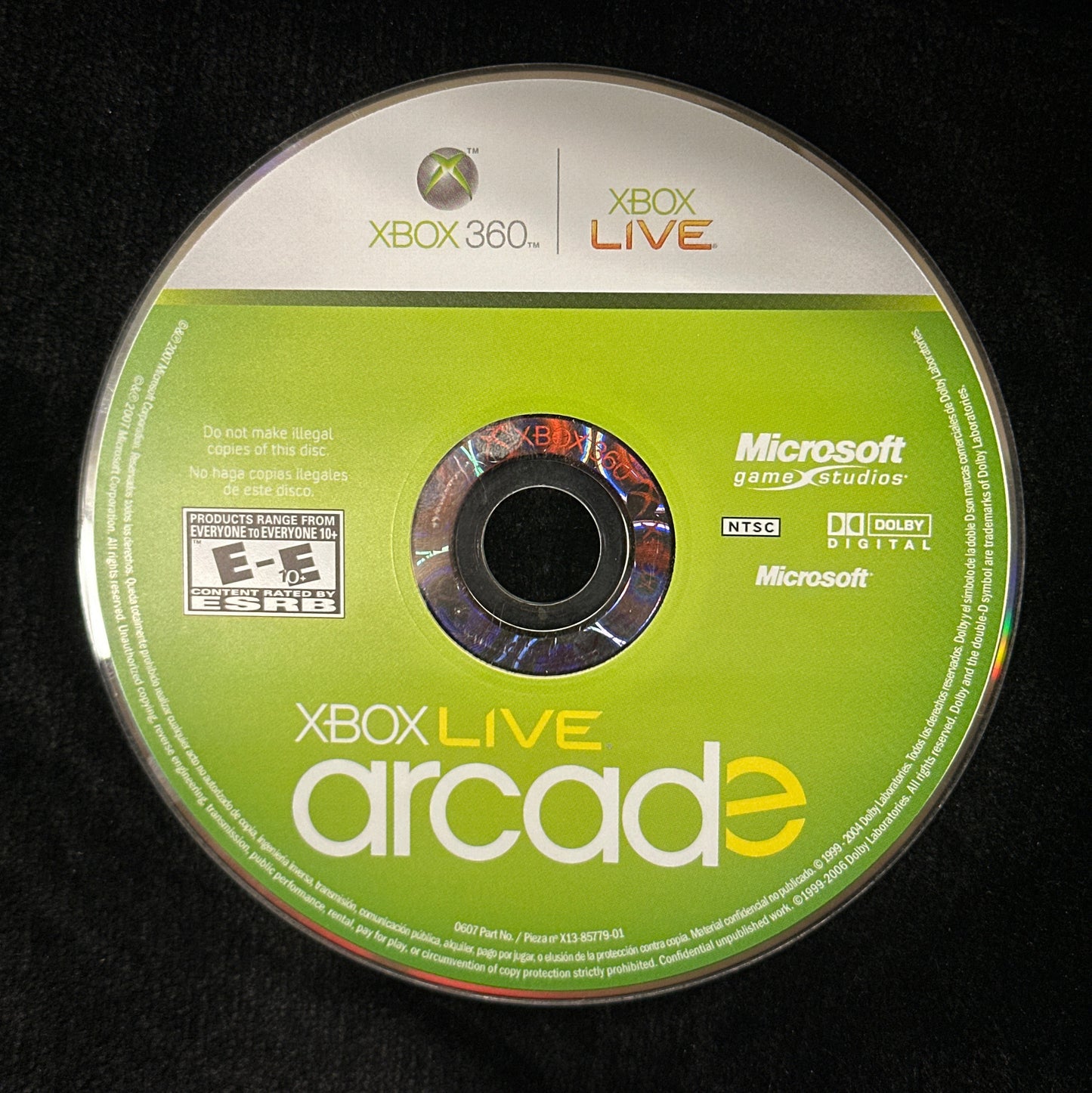 Xbox Live Arcade game disc on a black background