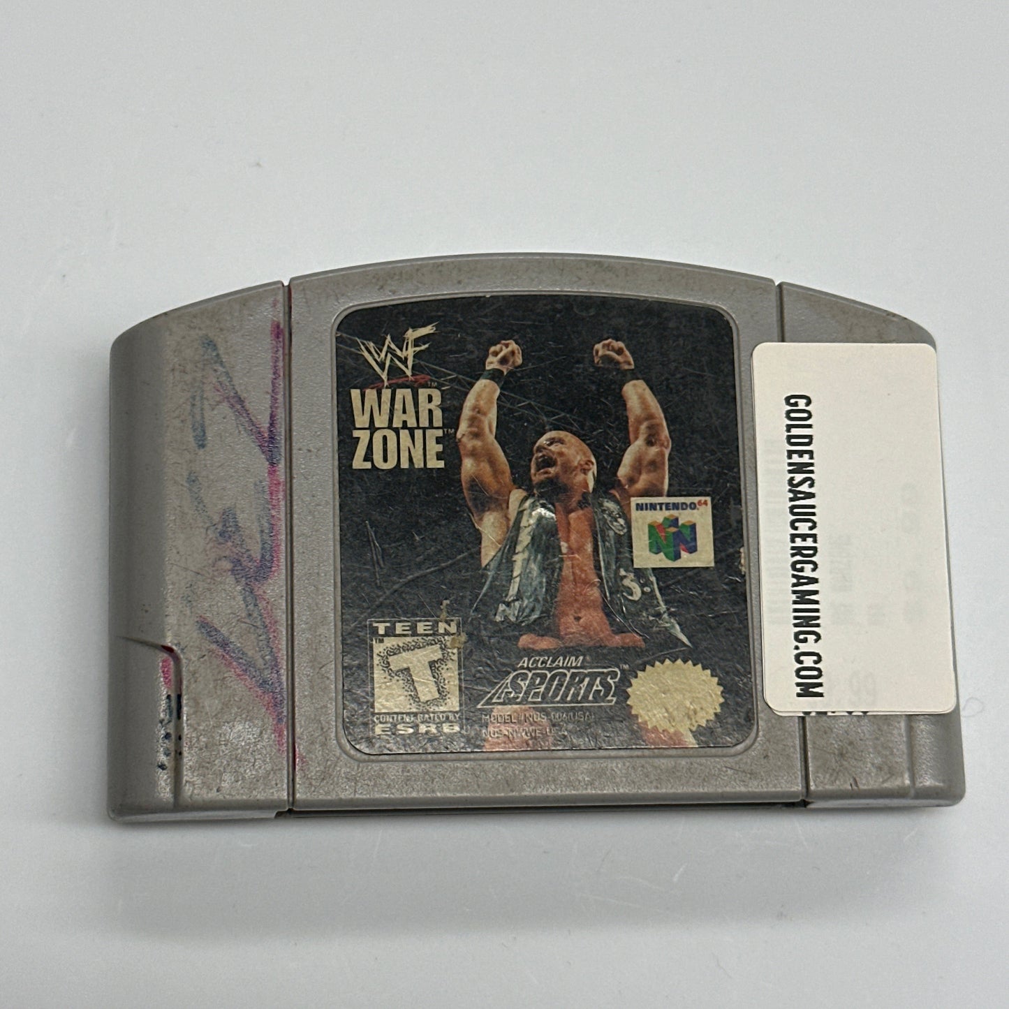 Vintage video game cartridge with 'War Zone' artwork on a white background