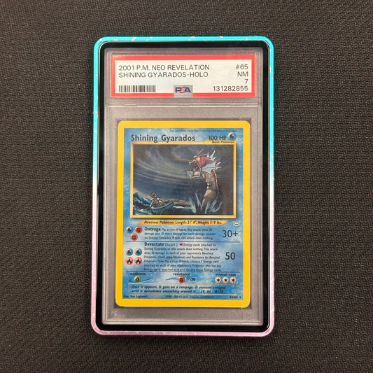 Shining Gyarados trading card in a protective case on a dark textured background