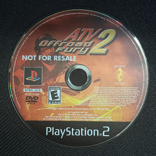PlayStation 2 game disc for 'City of Duty 2' on a dark textured background