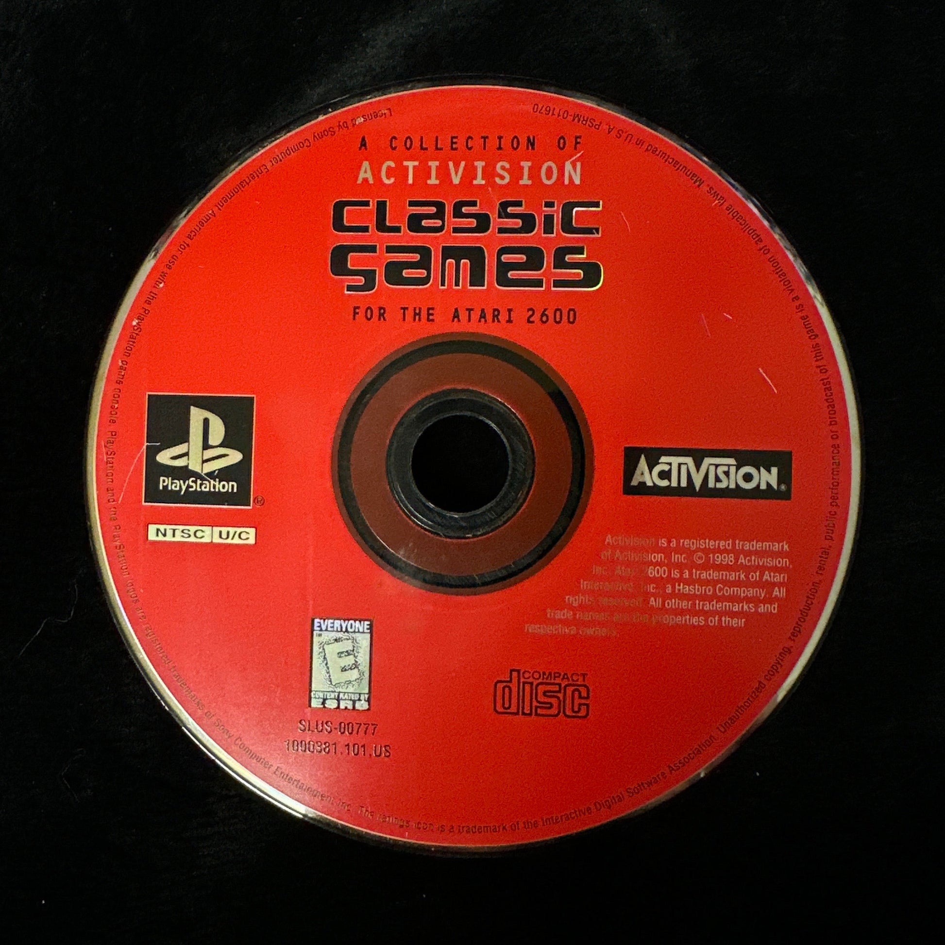Red game disc with Activision and PlayStation logos on a black background