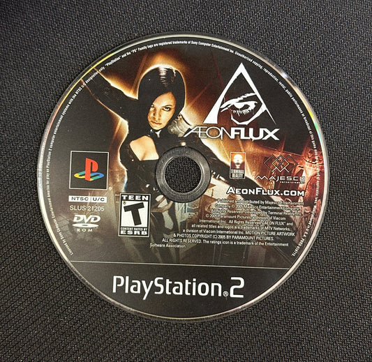 PlayStation 2 game disc with branding and graphics on a textured black surface