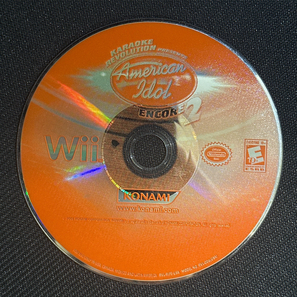 Wii game disc for 'American Idol' on an orange background