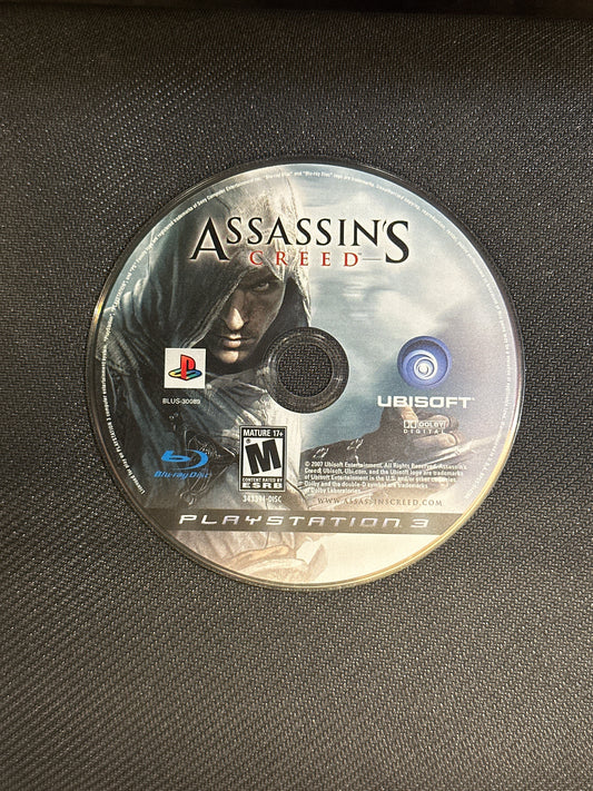 Assassin's Creed game disc on a textured surface