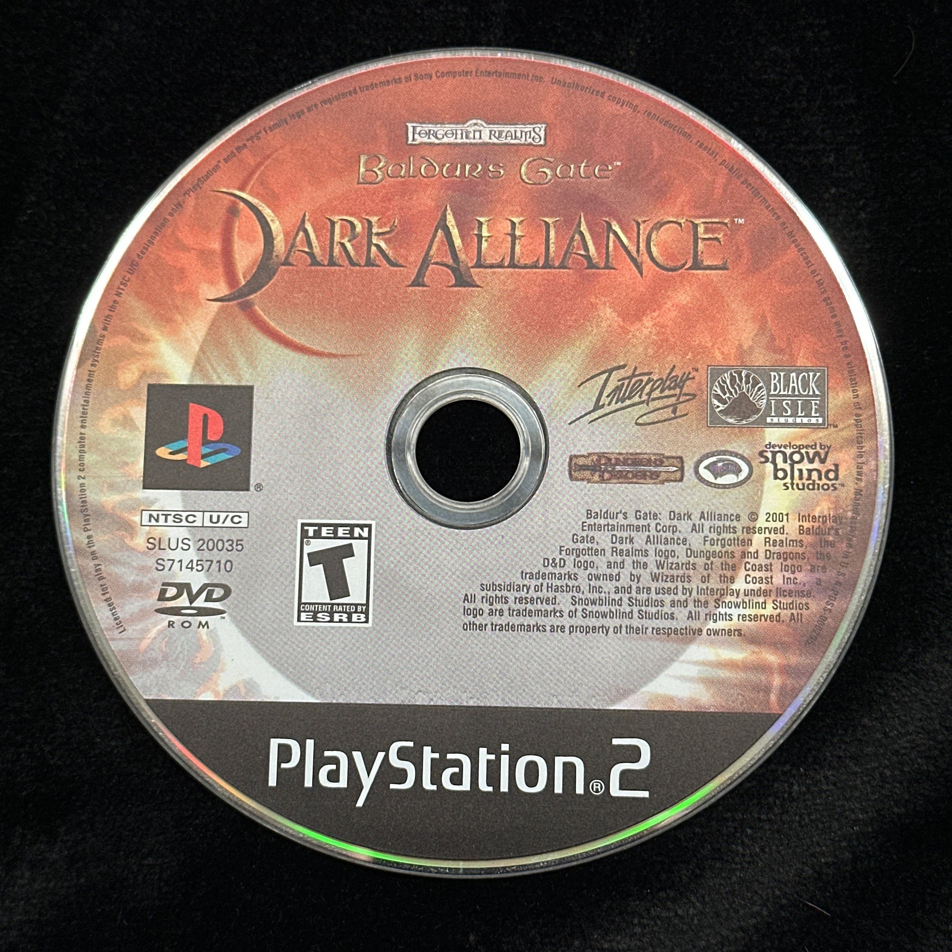 PlayStation 2 game disc labeled 'Dark Alliance' on a black background