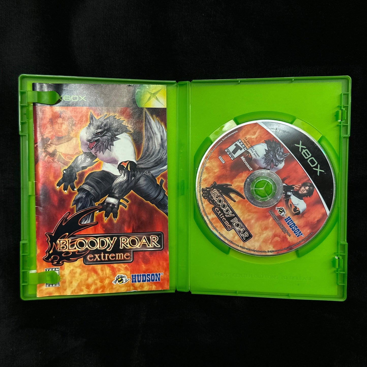 Xbox game case with disc on a dark background