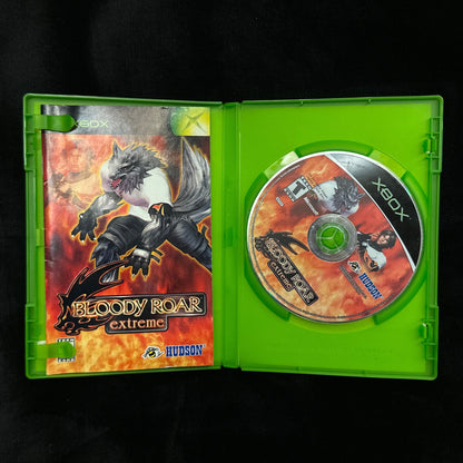 Xbox game case with disc on a dark background
