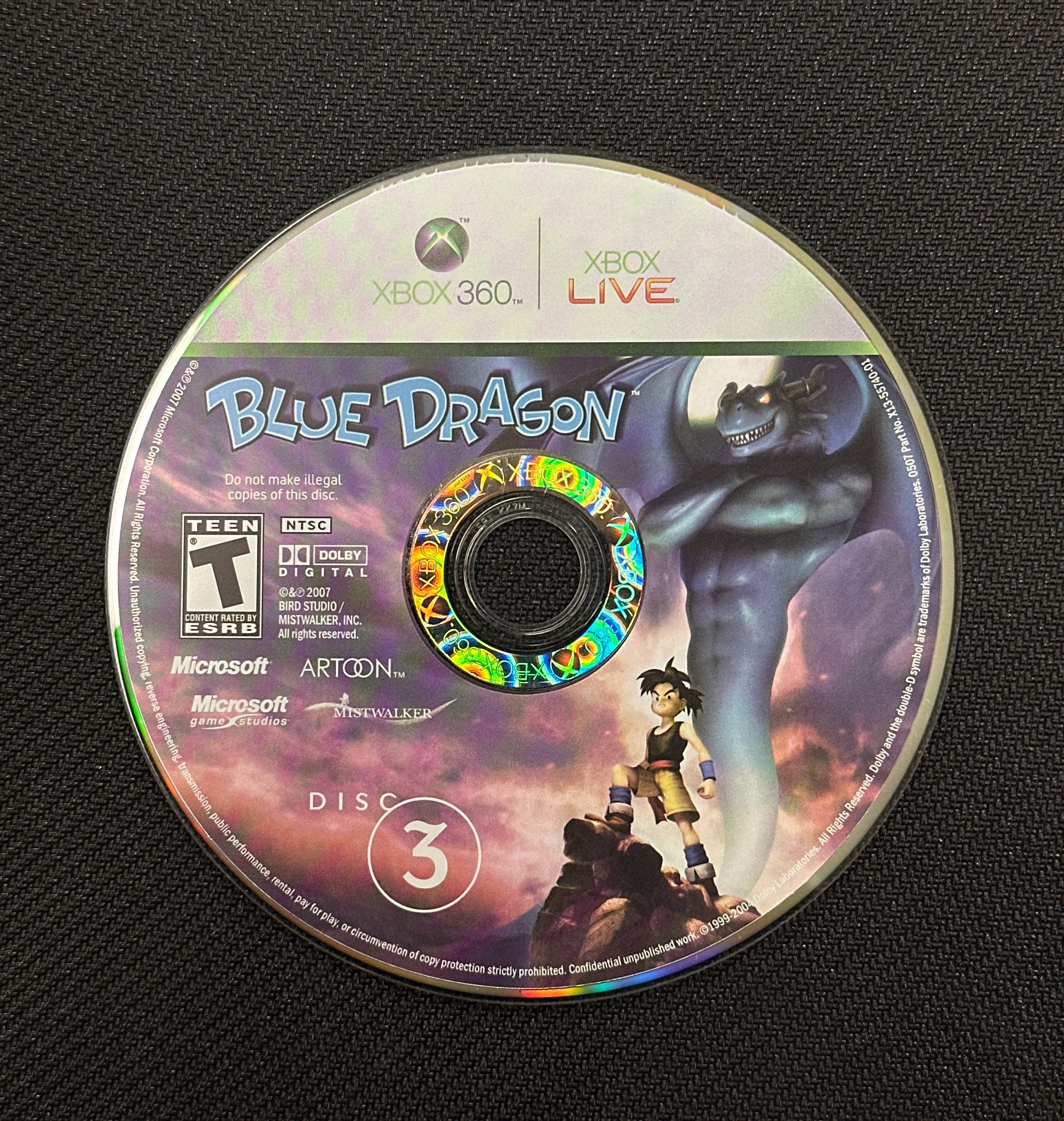 Game disc for 'Blue Dragon' on Xbox 360 with colorful design