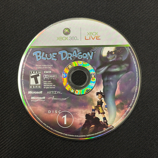 Game disc for 'Blue Dragon' on Xbox 360 with branding and graphics.