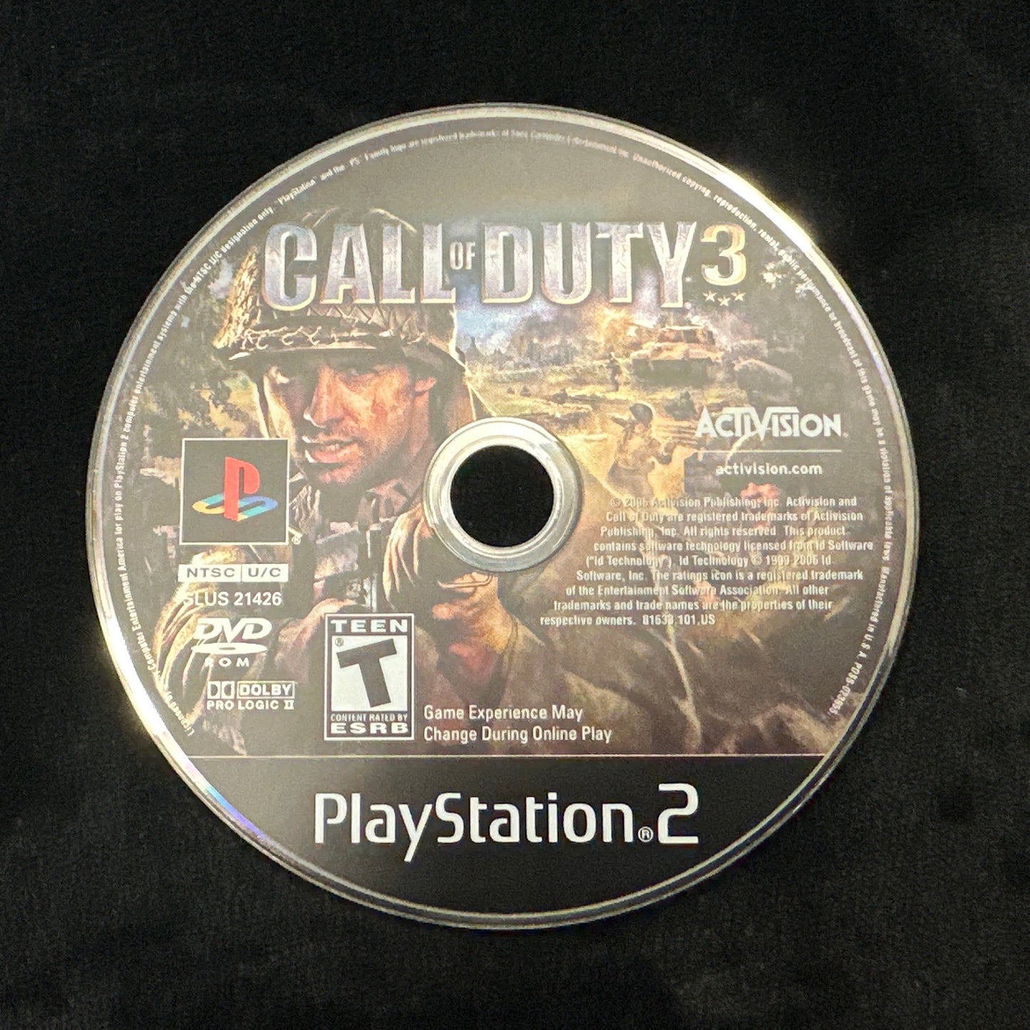 PlayStation 2 game disc for 'Call of Duty 3' on a black background