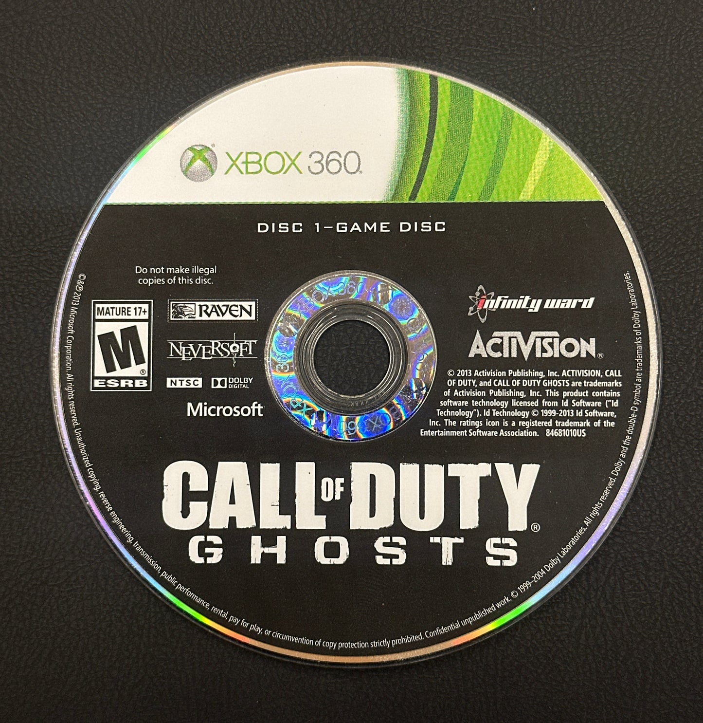 Game disc for 'Call of Duty: Ghosts' on a black background