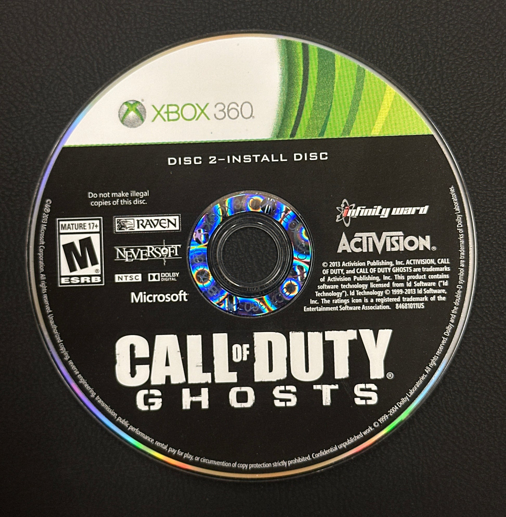 Call of Duty: Ghosts Xbox 360 game disc on a black background