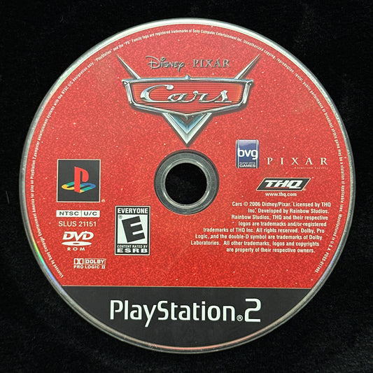 PlayStation 2 game disc for 'Cars' on a black background