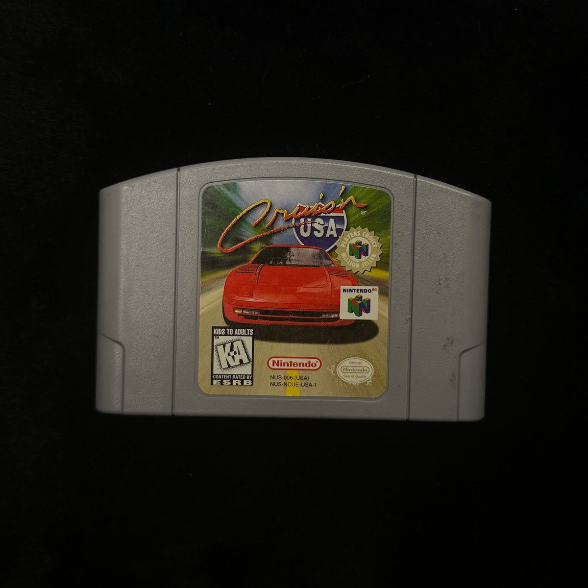 Cruis’n USA for Nintendo 64 game pak on black background