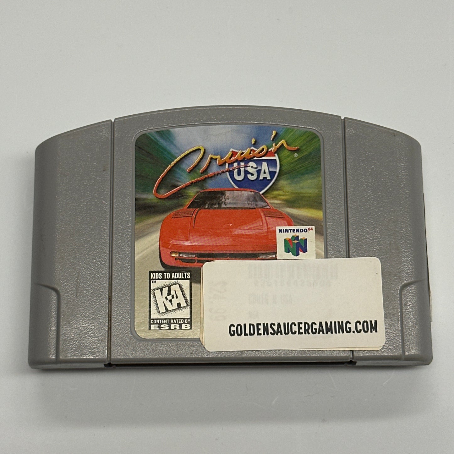 Game cartridge with a label on a gray background