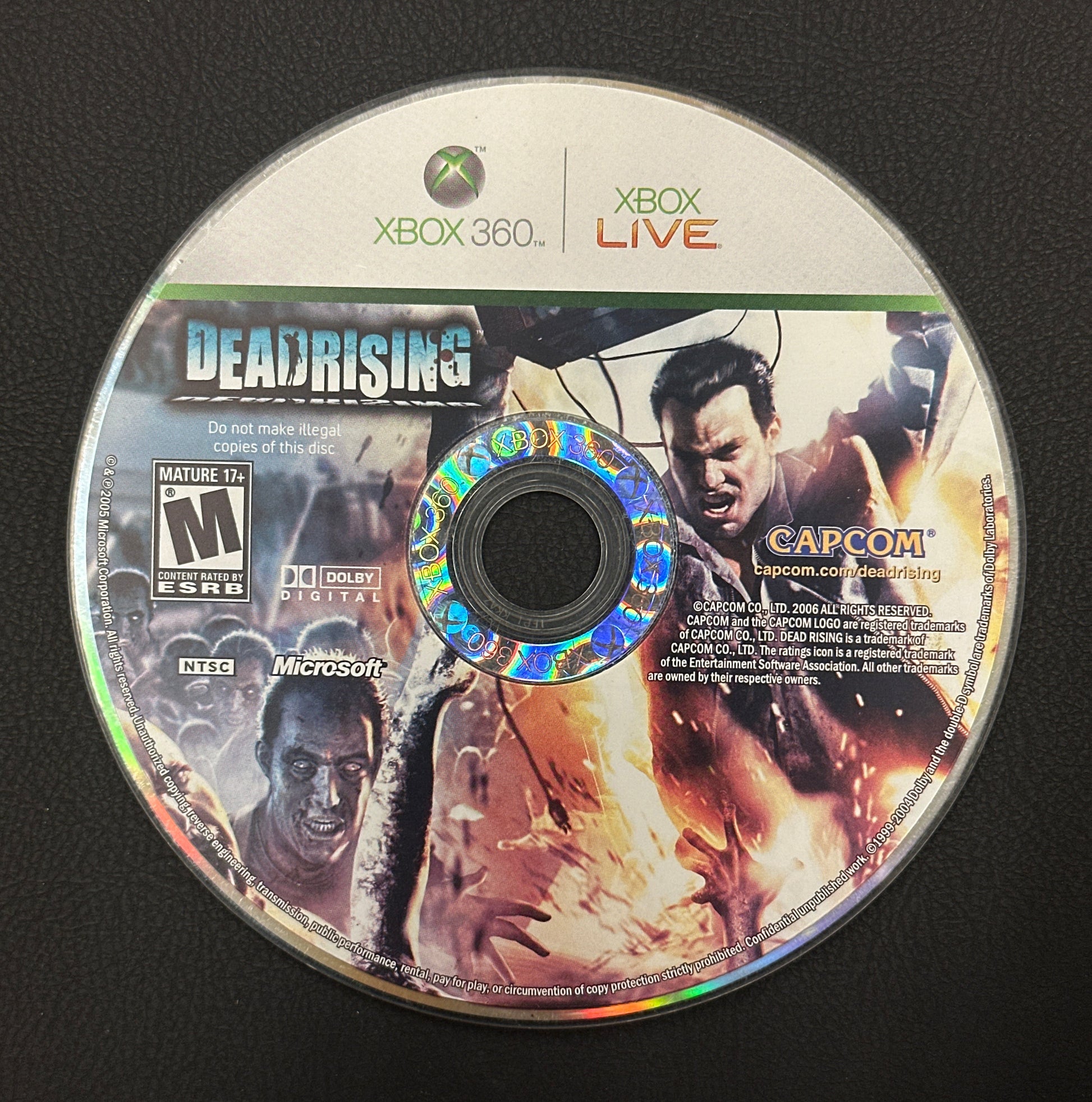 Game disc for 'Deathtroopers' on Xbox 360 with graphics and branding.