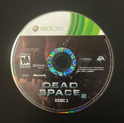 Dead Space 2 Xbox 360 game disc on a black background