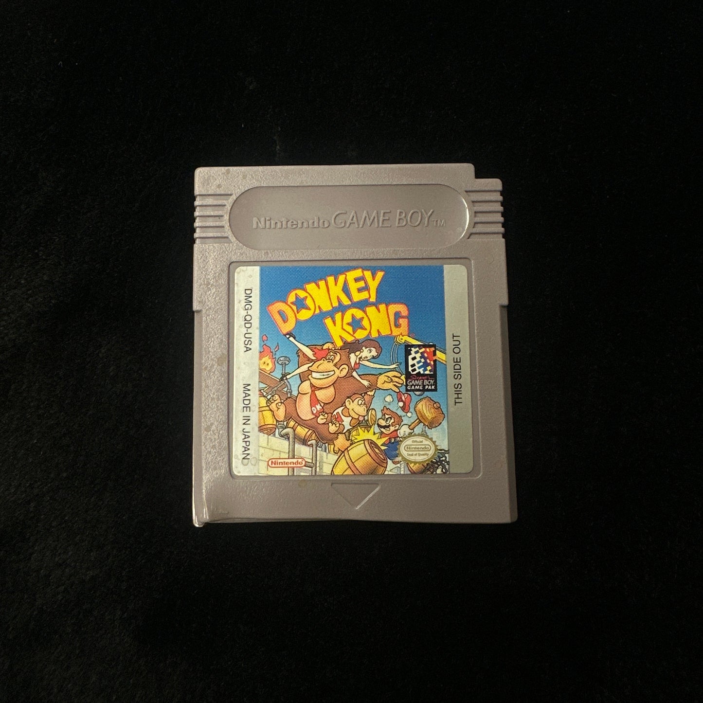 Game cartridge with 'Donkey Kong' on a black background