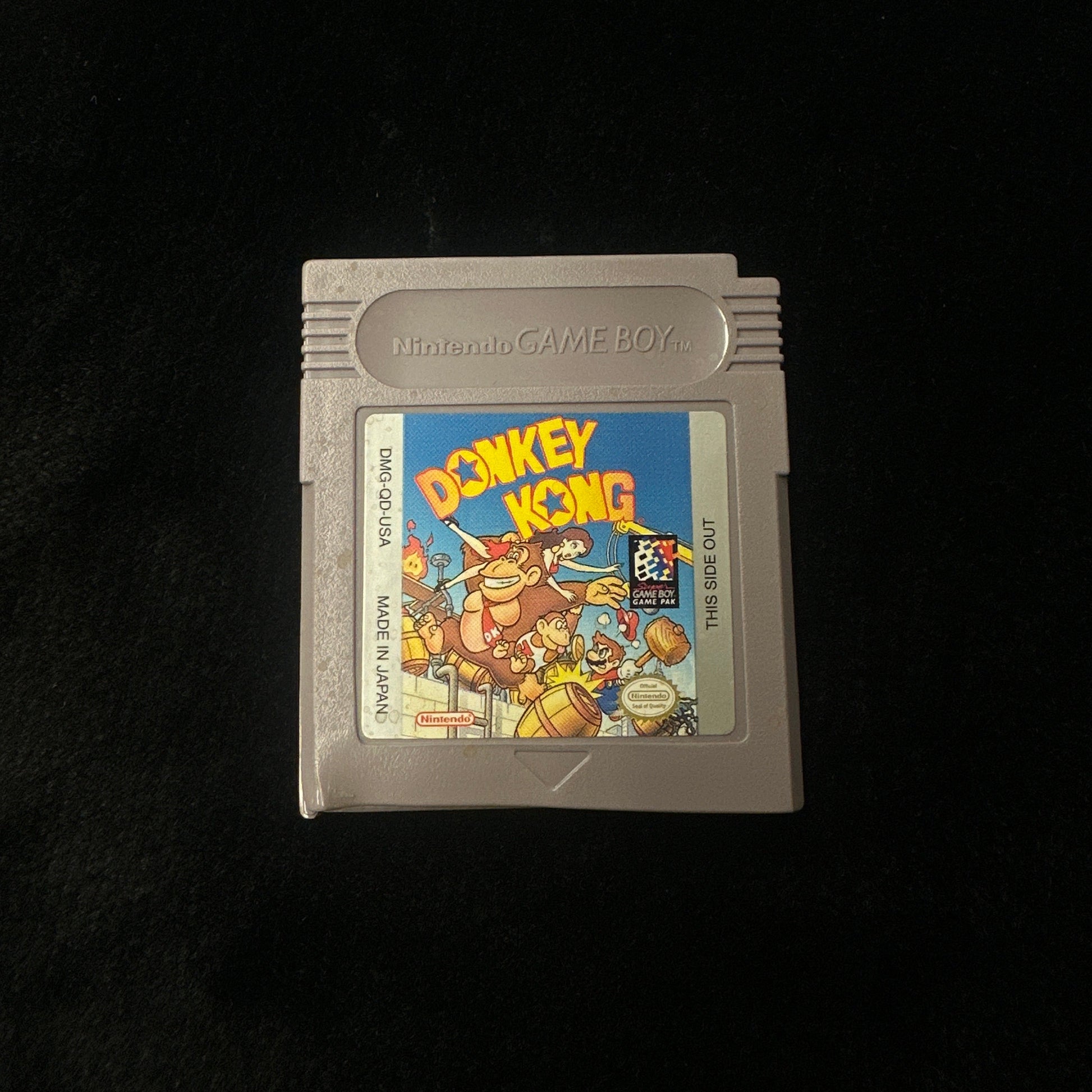 Game cartridge with 'Donkey Kong' on a black background