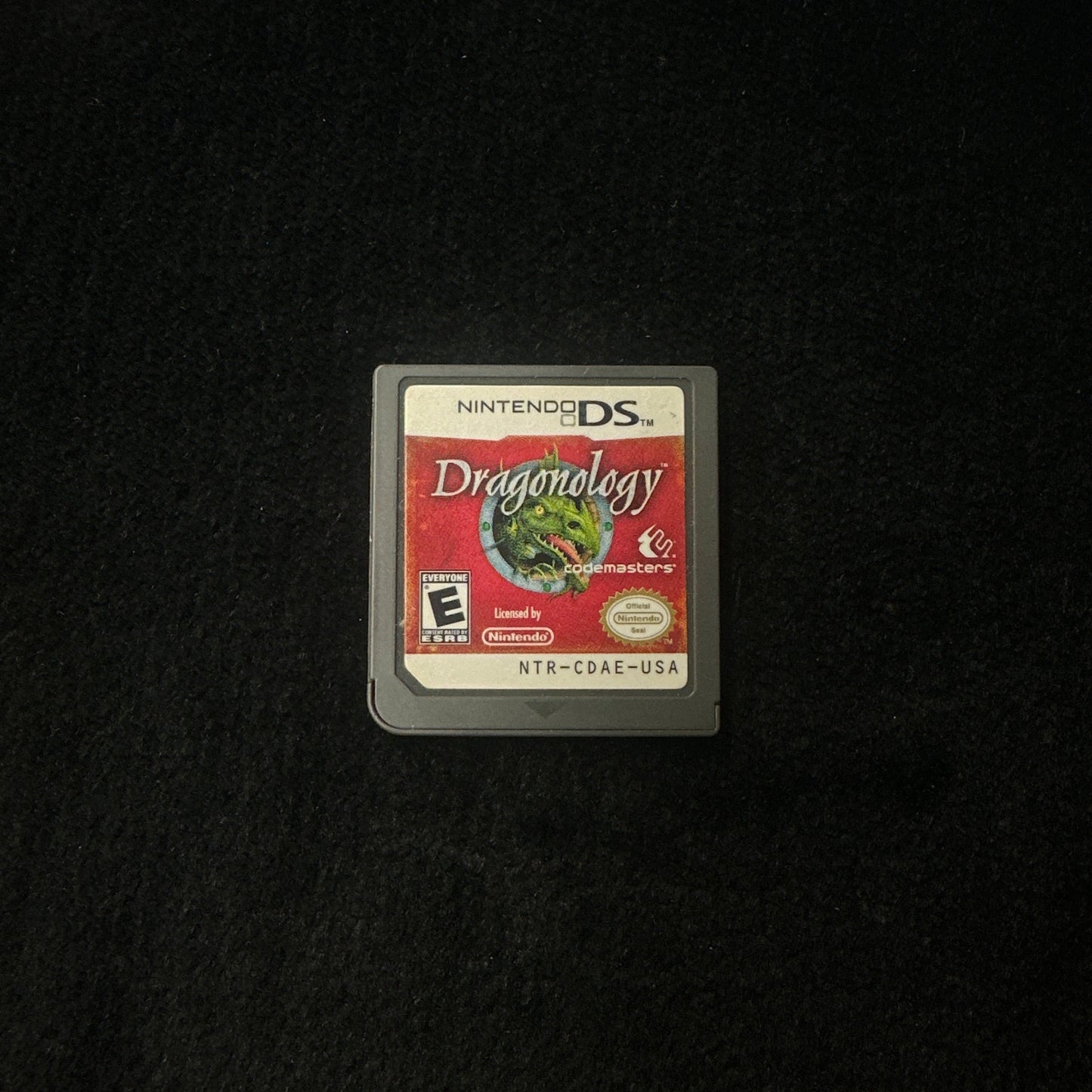 Nintendo DS game cartridge on a black background