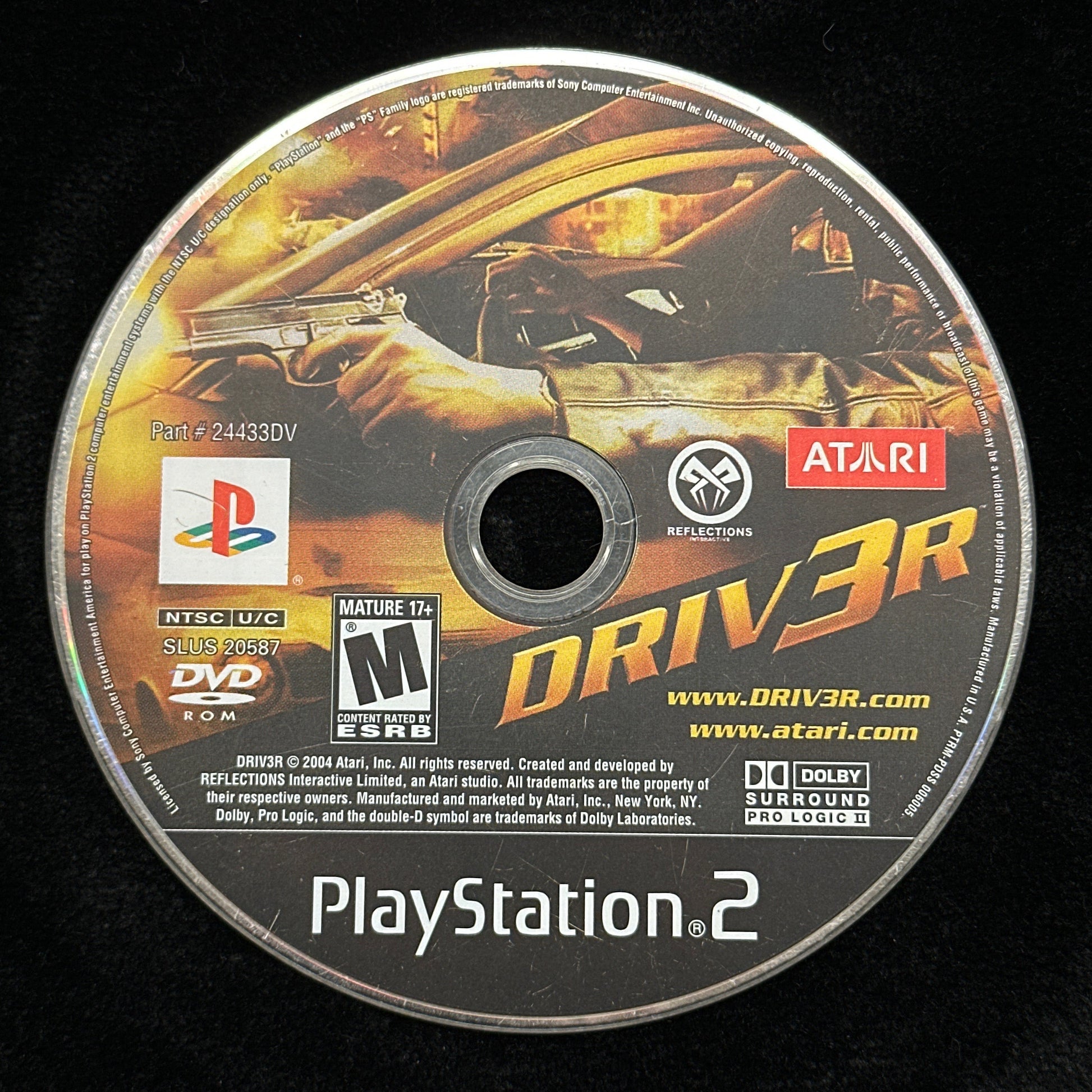 PlayStation 2 game disc with 'Driver' and Atari branding on a black background
