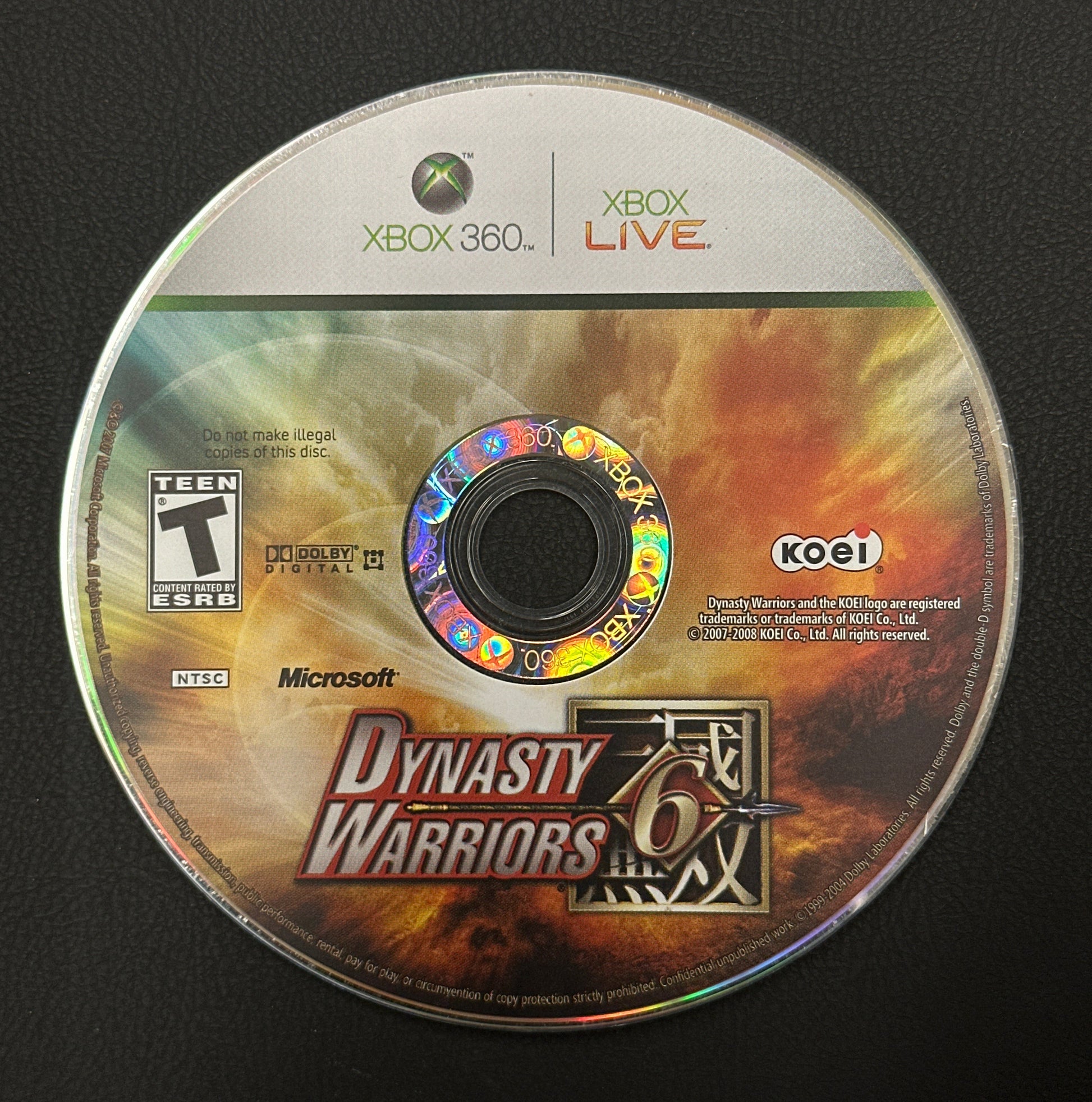 Game disc for 'Dynasty Warriors 8' on Xbox 360 with Microsoft logo