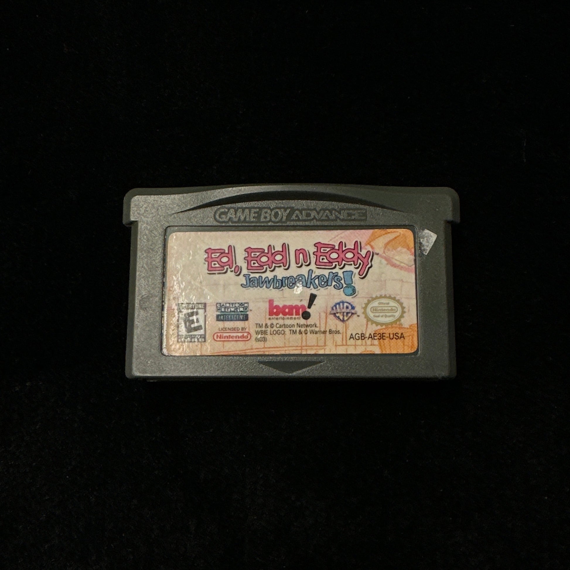 Game cartridge on a black background
